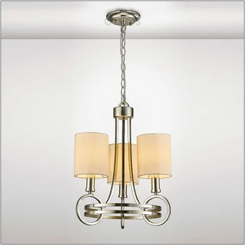 A Diyas IL31701 Isabella Pendant with a beige shade and three E14 lights is plated in antique silver.